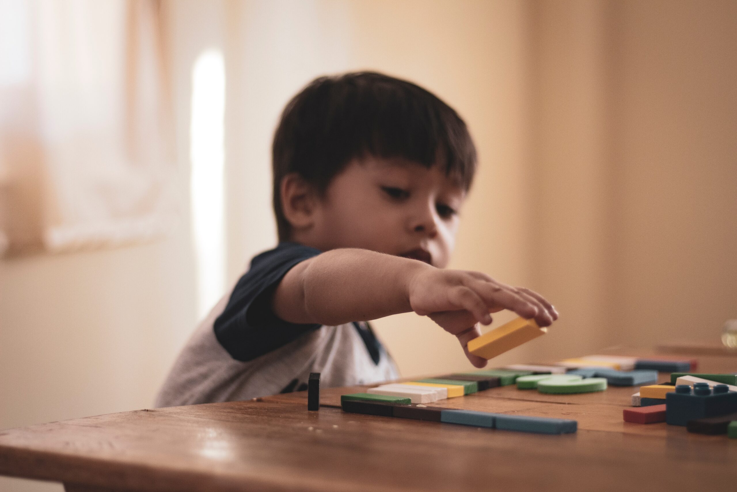 boy-playing blocks at birthday-party